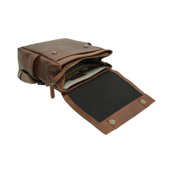 Το Gemini είπε An overhead, angled view of an open dark brown leather messenger bag or backpack lying flat against a white background. The main flap is flipped open to reveal a black mesh lining on its underside and magnetic snap closures. The interior shows multiple organized compartments with zippers and light-colored lining, showcasing the bag's storage capacity.