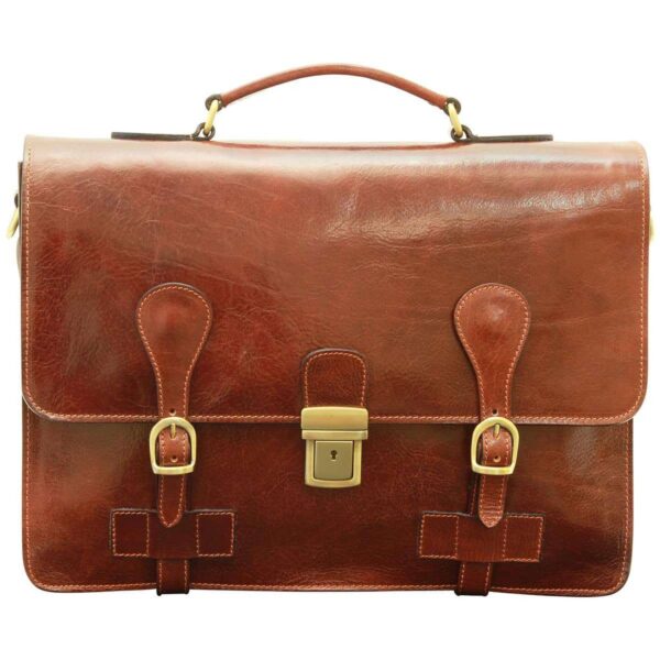 A front view of a cognac-colored leather briefcase with a rich, textured finish. It features a top carrying handle, two vertical leather straps with brass-tone buckles, and a central brass-tone metal clasp with a keyhole.
