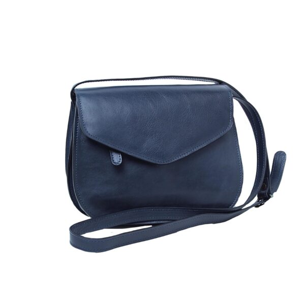 A navy blue leather crossbody saddle bag featuring a pointed front flap with a small leather tab, a rounded silhouette, and a matching adjustable leather shoulder strap, presented against a plain white background.