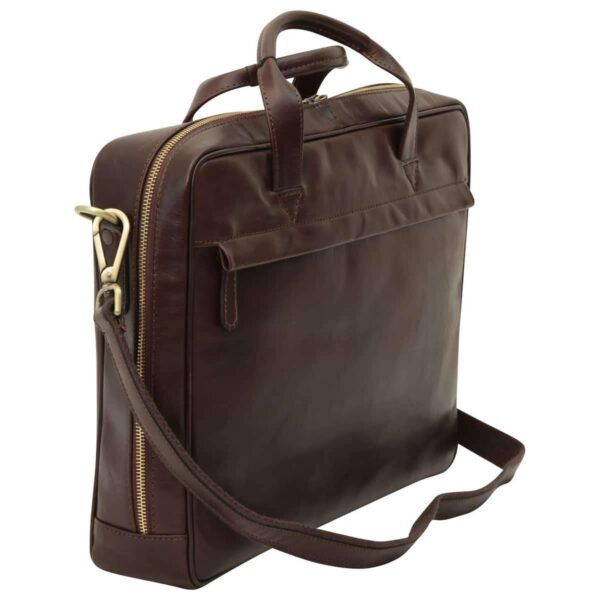 `Dark brown genuine leather laptop briefcase with antique gold zipper and carabiner clip, front slip pocket, double top handles and adjustable shoulder strap, side angle view`