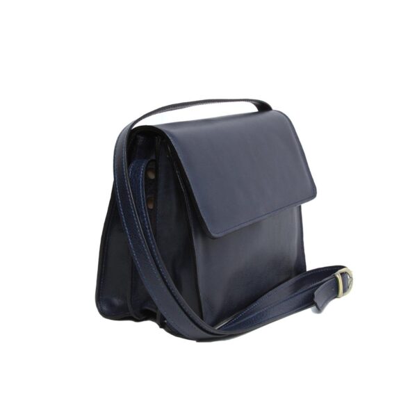 A three-quarter side view of a **navy blue leather messenger bag** against a white background. The bag features a minimalist fold-over flap design, multiple internal sections visible from the side, and a slim, matching leather shoulder strap with a brass buckle.