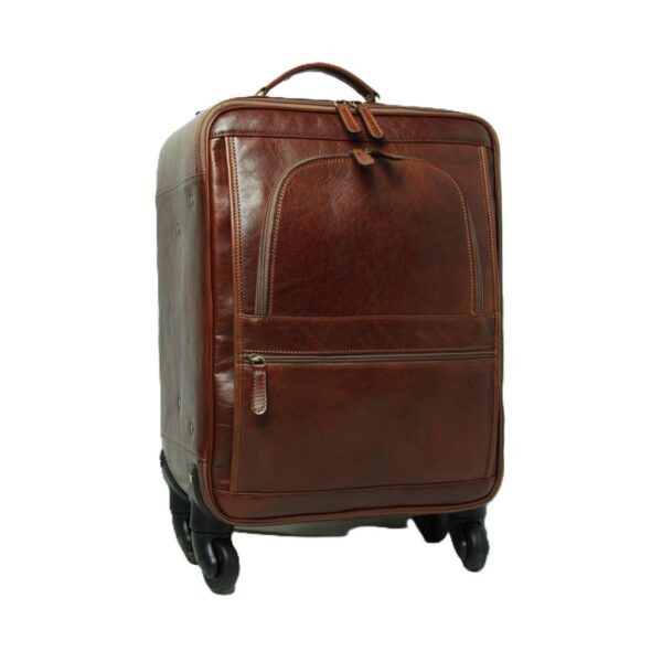 A front-facing studio shot of a **brown leather spinner suitcase** against a white background. The luggage features a rich, polished finish, multiple **zippered exterior pockets**, a leather top handle, and four multidirectional wheels for easy mobility.