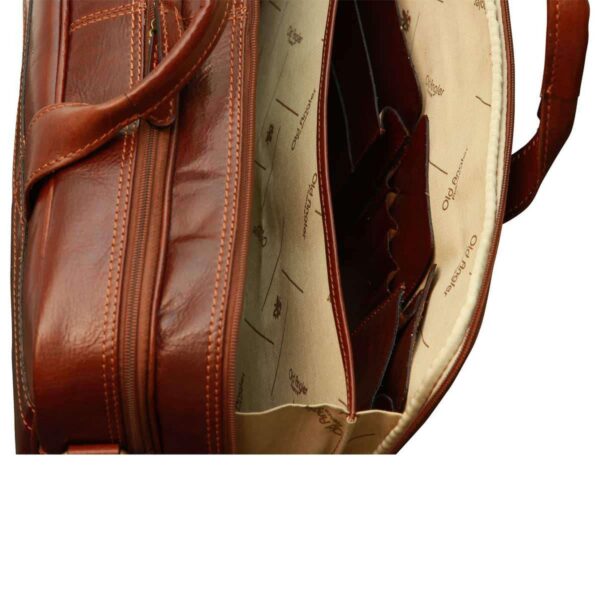 A top-down view of an open reddish-brown leather briefcase, highlighting the interior organization including a patterned fabric lining, multiple slip pockets, and dedicated slots for pens and business cards.