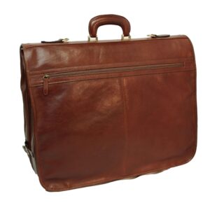 A front view of the **brown leather garment bag** folded into its carrying position, resembling a large briefcase. It features a sturdy **top handle**, a full-width horizontal **zippered pocket** on the front, and elegant brass-toned hardware.