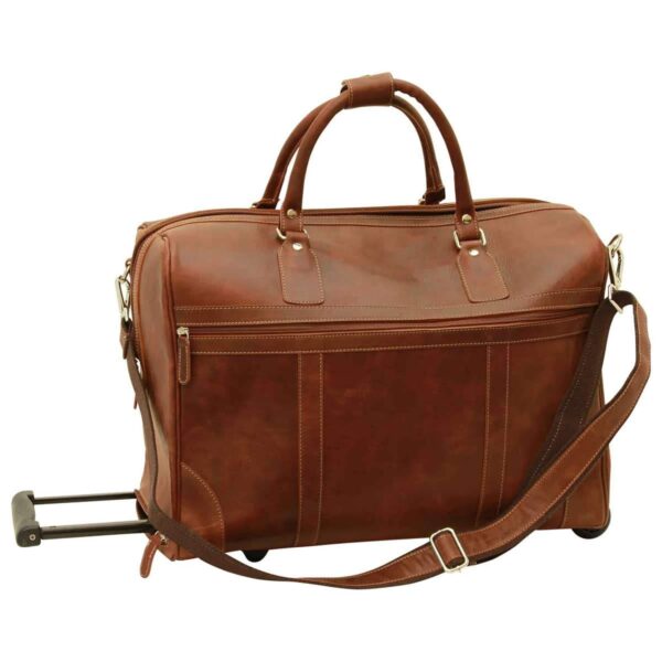 A cognac-colored leather rolling duffel bag featuring sturdy top handles with a connector, an adjustable shoulder strap, a front zippered compartment, and an extended telescopic handle for easy transport.