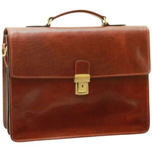 Front view of a polished dark tan leather briefcase featuring a large rectangular flap, a slim top handle with brass D-rings, and a centered brass tuck-lock closure with a keyhole.