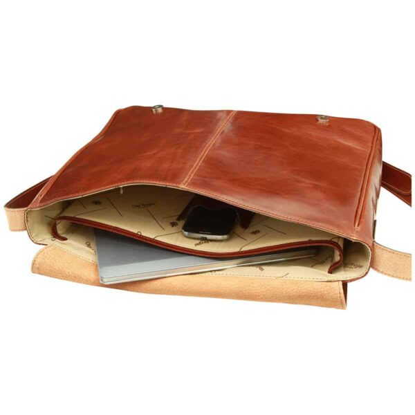An open reddish-brown leather messenger bag showcasing its interior organized with a laptop and a smartphone, featuring a patterned fabric lining and magnetic snap fasteners on the underside of the flap.