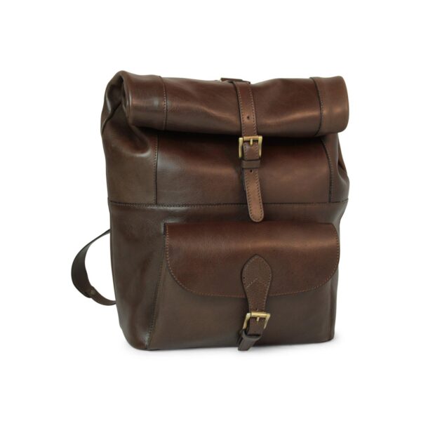 A vintage-style, dark brown leather backpack with a roll-top closure secured by a strap and brass buckle, plus a single front pocket.