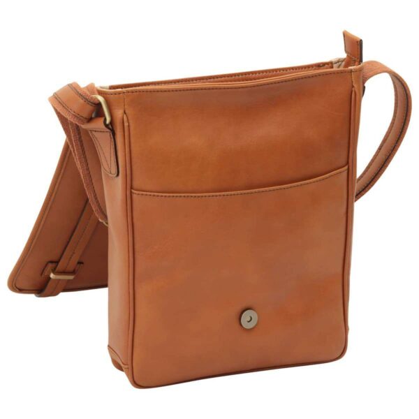 A front view of the tan leather messenger bag with the flap open, showing a magnetic snap closure, an external front slip pocket, and the attachment points for the canvas shoulder strap.