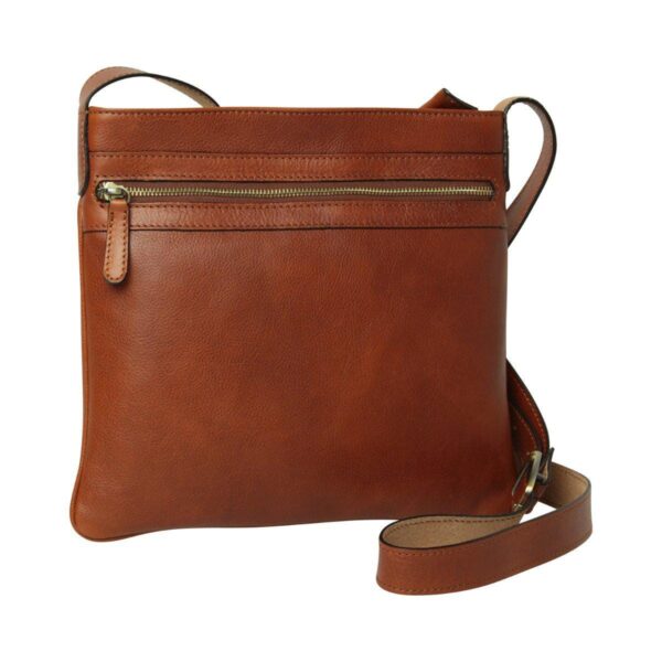 Front view of a cognac-colored leather crossbody bag, featuring a horizontal front zippered pocket, an adjustable shoulder strap, and a slim, square silhouette.