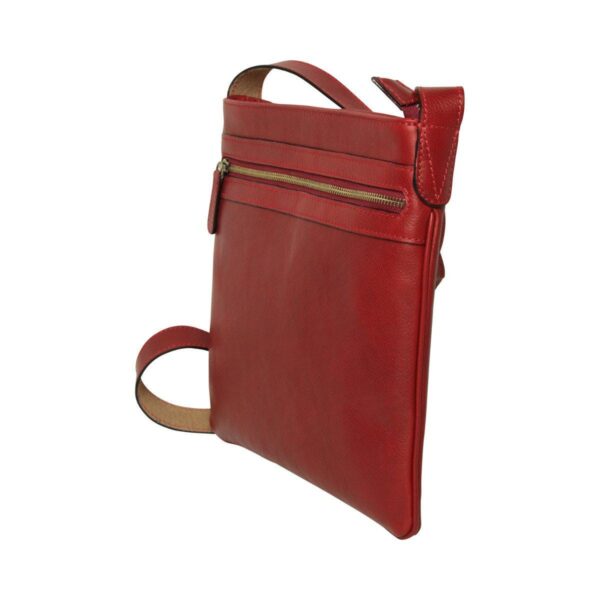 A three-quarter view of a red leather crossbody bag, showing a front zippered pocket and a sleek, flat design with a matching shoulder strap.