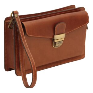 Three-quarter view of a tan leather clutch bag with a wrist strap, front flap, and antique brass tuck lock fastener
