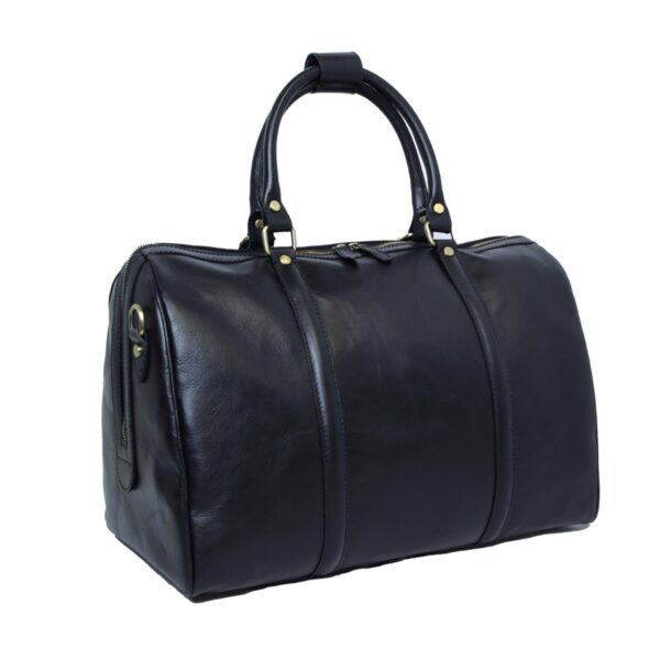 A three-quarter view of a structured black leather duffel bag featuring rolled top handles, brass-tone hardware, and reinforced vertical leather straps along the body.
