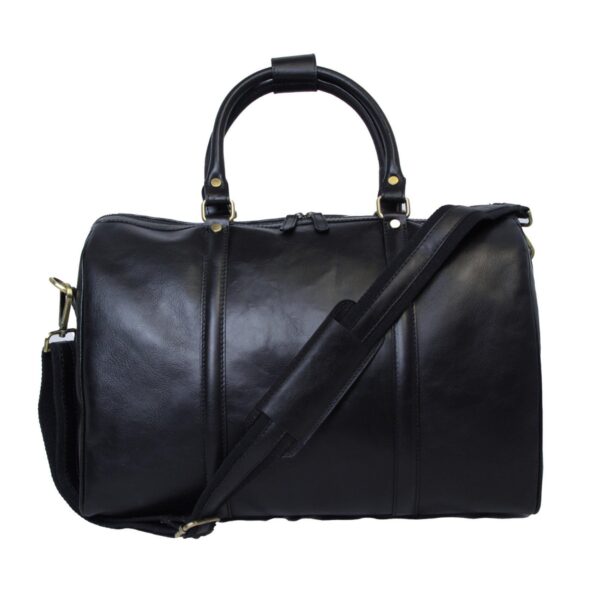 Front view of a black leather duffel bag featuring rolled leather top handles with a connector, a detachable black canvas shoulder strap with a leather comfort pad, and brass-tone hardware.