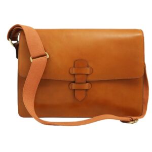 The back view of a horizontal tan leather messenger bag, featuring a large zippered pocket with a leather pull tab and a matching leather shoulder strap.