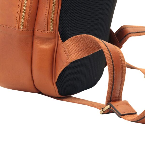 Close-up of tan leather backpack padded shoulder straps and brass buckle detail — handcrafted Italian leather backpack`