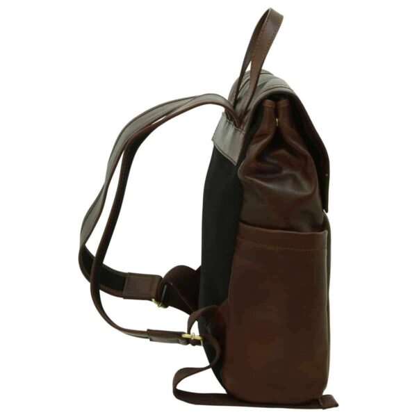 A dark brown leather backpack viewed from the side, showcasing its construction and features. It has leather shoulder straps, a leather top handle, a main compartment flap, a side pocket, and a black mesh panel on the back for breathability.