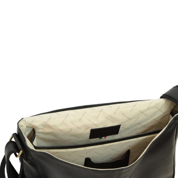 An interior view of a black leather bag showing the cream-colored fabric lining with "MADE IN ITALY" branding, multiple internal compartments, and an Italian flag detail.