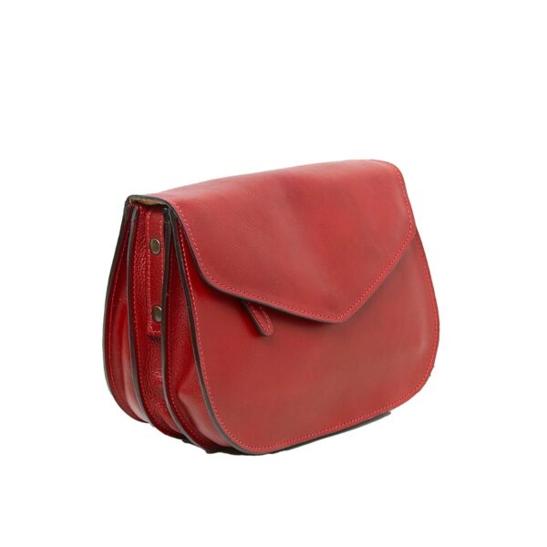 A vibrant red leather crossbody saddle bag with a rounded base, featuring a layered accordion-style design and a pointed front flap closure against a plain white background.