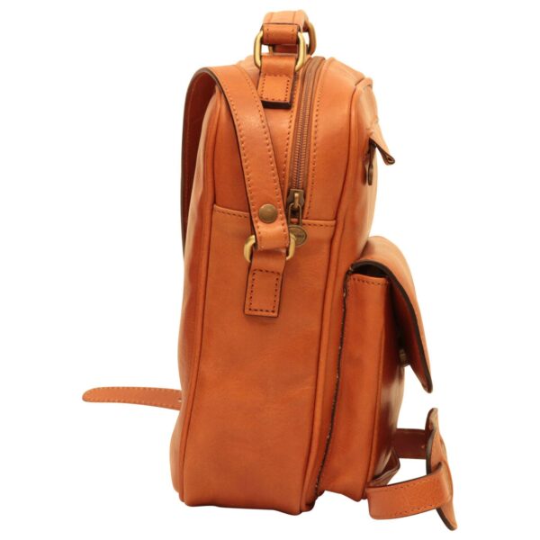 `Tan genuine leather compact crossbody bag with antique gold zipper, front flap pocket, top carry handle and adjustable shoulder strap, side view`