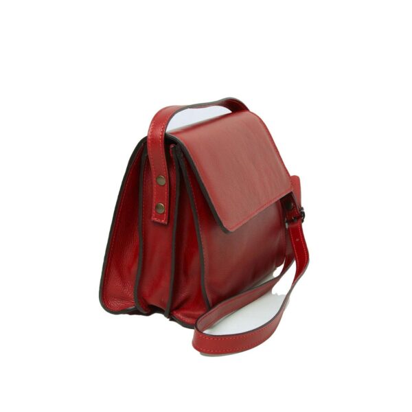 A three-quarter side view of a vibrant **red leather messenger bag** with a fold-over flap. The bag features a multi-compartment accordion design, a matching leather shoulder strap, and brass-toned stud details on the side, set against a white background.
