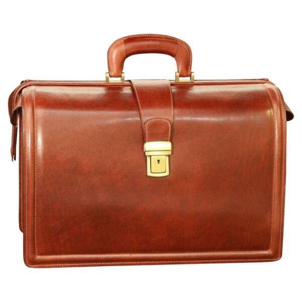 A front-facing view of a cognac-colored leather doctor-style briefcase, featuring a sturdy top handle, a central leather strap with a gold-tone keyhole lock, and elegant perimeter stitching.