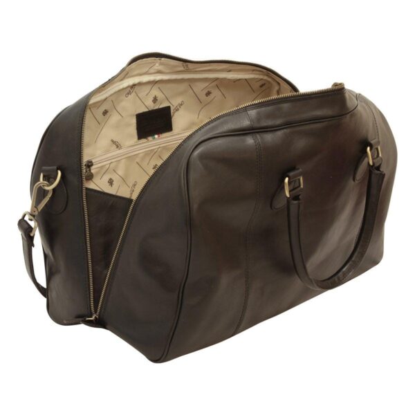 An open view of a dark brown leather duffel bag, revealing a spacious interior lined with a patterned cream fabric, an internal zippered pocket, and a black leather brand patch.