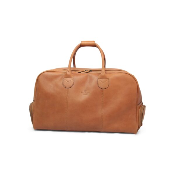 A front-facing view of a tan leather duffel bag on a white background, showing its smooth leather exterior, reinforced handle attachments with decorative stitching, and a small embossed brand logo in the center.