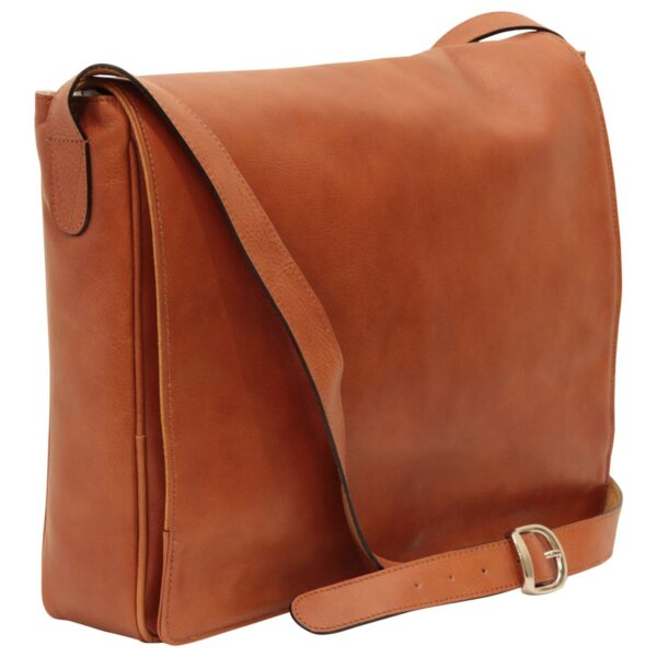 A light brown leather messenger bag with a large front flap, a structured rectangular body, and an adjustable shoulder strap featuring a silver-tone buckle against a white background.
