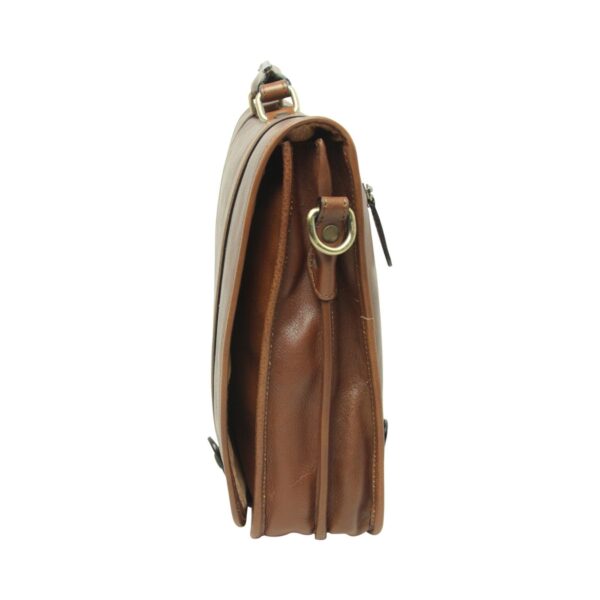 A side-profile view of a brown leather messenger bag against a white background. The image highlights the multi-gusseted expansion design, a brass D-ring for a shoulder strap attachment, and the sturdy top handle secured with metal hardware.