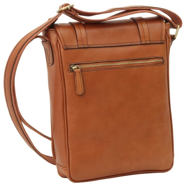 A back-angled view of a tan leather messenger bag featuring a horizontal zippered pocket, brass hardware, and a matching adjustable canvas shoulder strap.