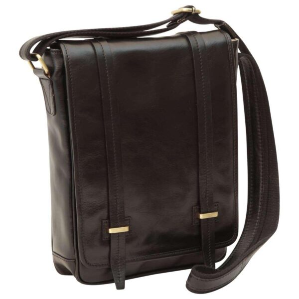 A front-angled view of a black leather messenger bag with a vertical design, featuring two long decorative straps with gold-toned metal hardware on the front flap and an adjustable shoulder strap.