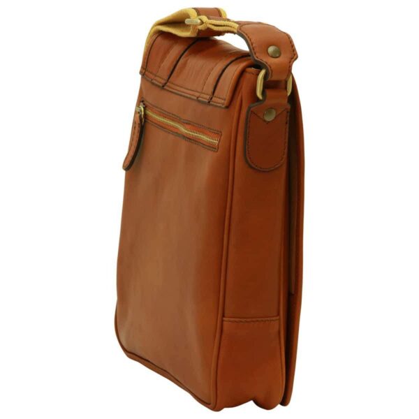 Back three-quarter view of a tan leather messenger bag featuring a vertical zippered pocket and an adjustable fabric shoulder strap