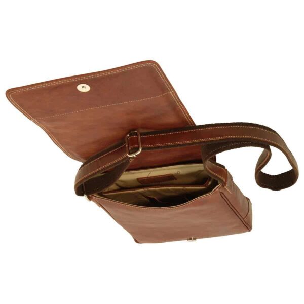 An interior view of the tan leather messenger bag with the flap open, revealing a light-colored fabric lining with multiple internal compartments and a brown adjustable canvas shoulder strap.