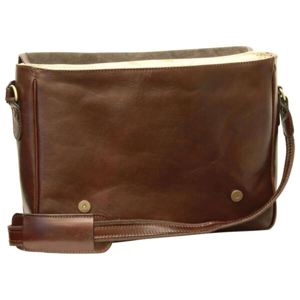 A front-facing view of a dark brown leather messenger bag with the top flap open, revealing magnetic snap closures and a beige interior lining, complete with an adjustable leather shoulder strap.