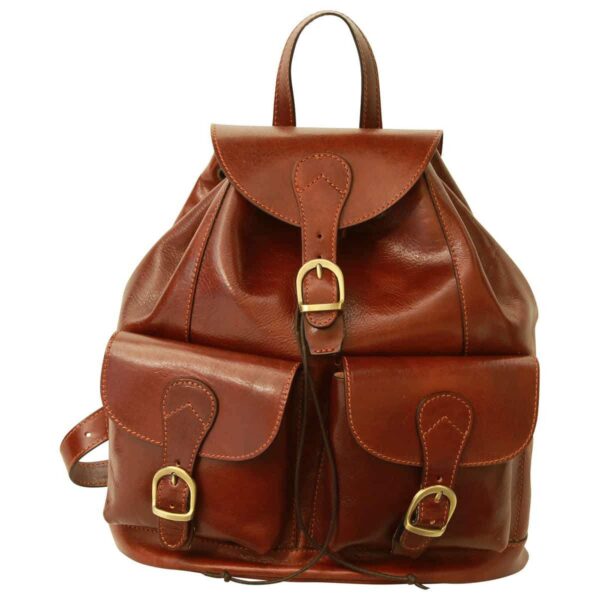 A full-view shot of a vintage-style brown leather backpack featuring a main compartment flap with a buckle closure, two front pockets also with buckle straps, a small top handle, and rich, polished leather with fine stitching throughout.