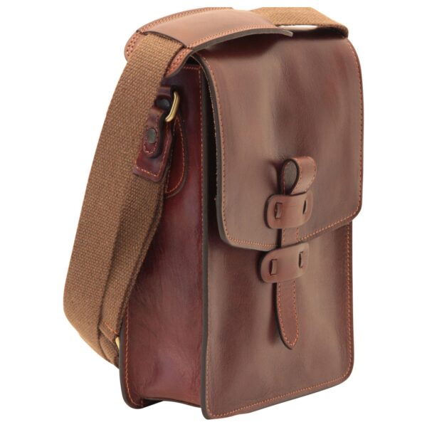 A three-quarter view of a brown leather messenger bag with a front flap and buckle closure, featuring a durable, adjustable brown canvas shoulder strap.