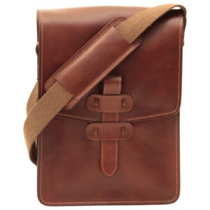 Front view of a rectangular brown leather messenger bag with a flap closure and a vertical leather strap fastening, featuring a brown canvas shoulder strap with a leather comfort pad.
