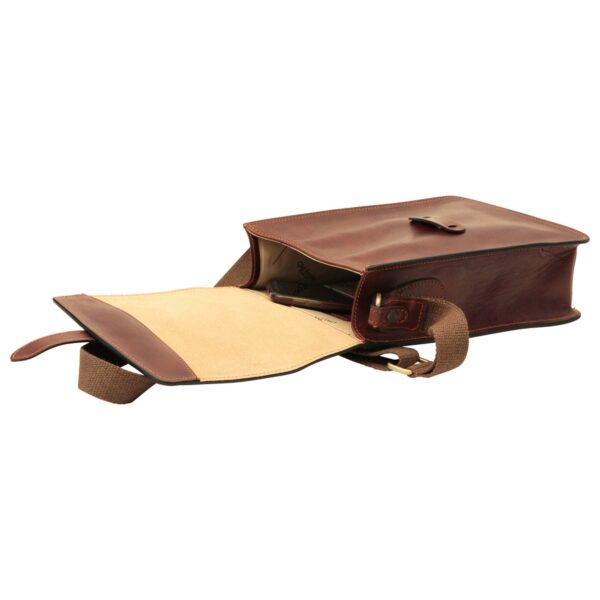 An open, brown leather messenger bag shown from a top-down view, revealing a light-colored fabric lining with a patterned logo, an internal pocket, and a wide canvas shoulder strap.