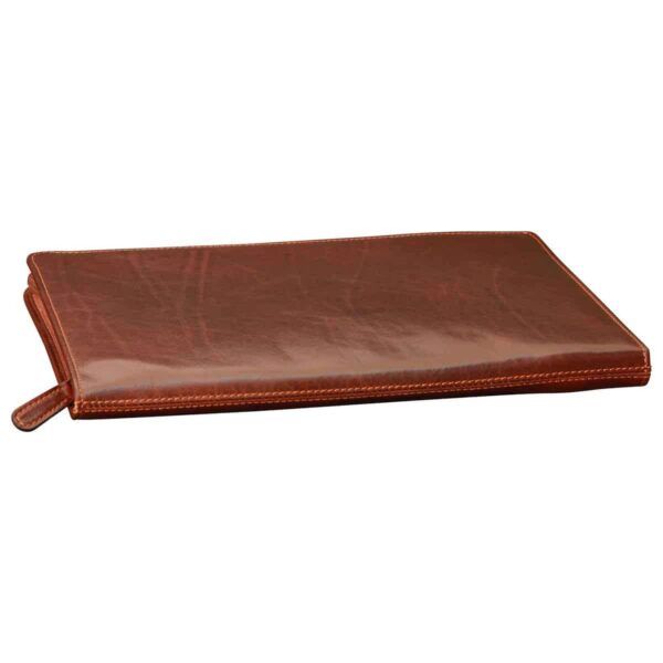 A slim, closed leather portfolio in a rich chestnut brown finish, featuring visible perimeter stitching and a matching leather zipper pull. The leather shows a subtle, natural grain and a polished sheen, laid flat against a white background.